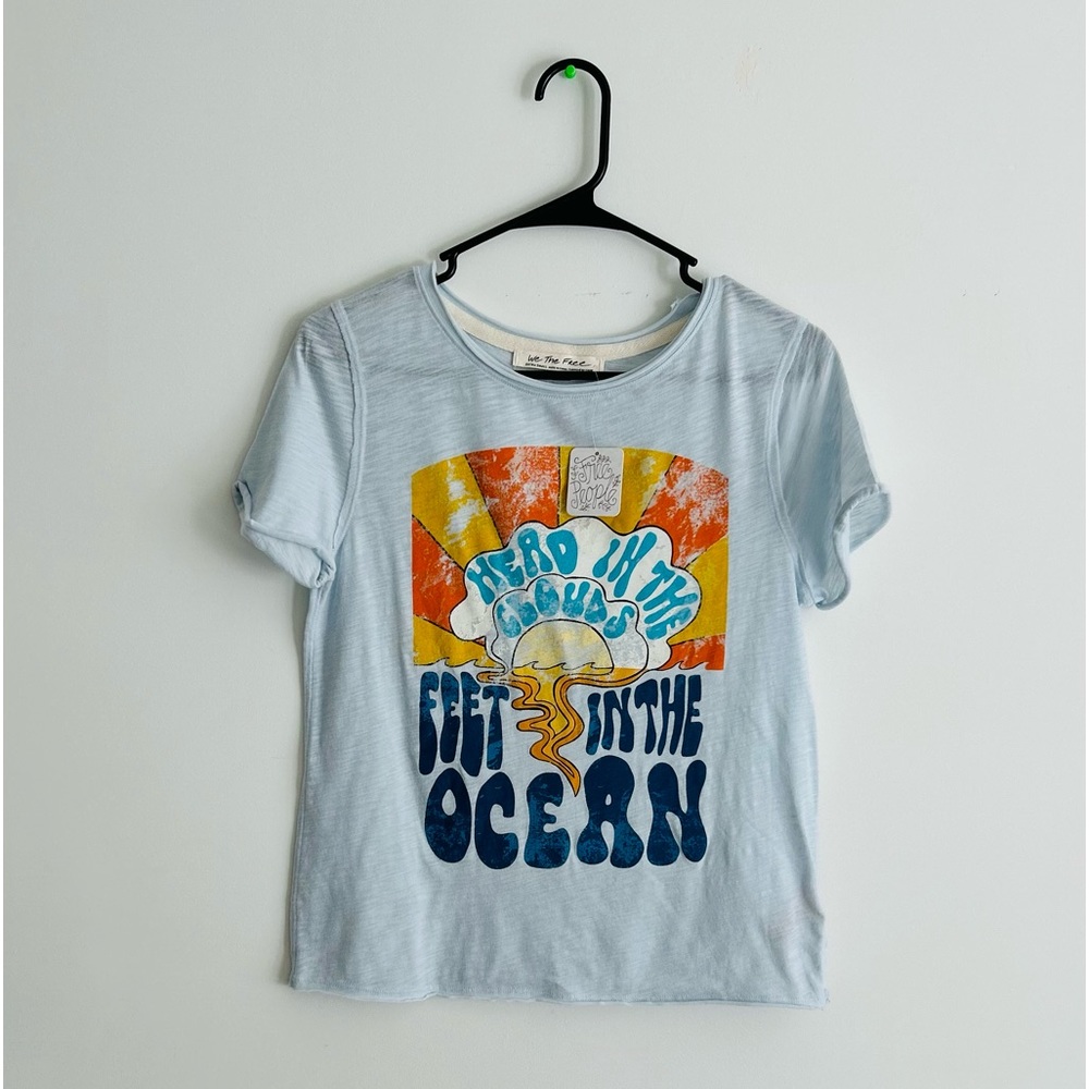 Free People, Light Blue “Head in the Clouds Feet in the Sand” Tee. Size XS.